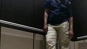 Ebony babe gets fingered and cums in public elevator scene