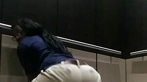 Ebony babe gets fingered and cums in public elevator scene