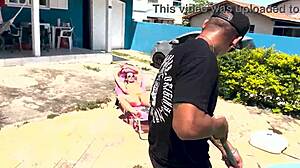 Wife patiently waits for husband to leave before visiting the neighbor outdoors