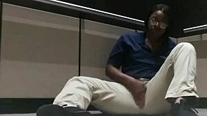 Ebony babe gets fingered and cums in public elevator scene