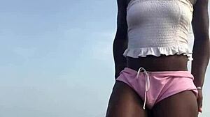 Crazy bitch twerks hard in sexy clothes on beach