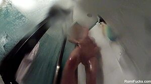 Romi Rain showers off her big tits and ass while masturbating!