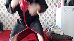 young gay cums on his belly during bdsm.