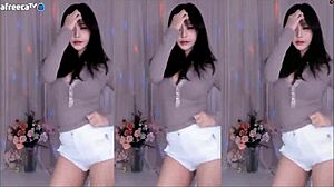 Korean Girl Dances, Showing Big Tits?