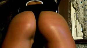 Alex Zothberg, pornstar, in BDSM scene where he is flogged while doing splits