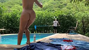 Natasha And Megan Tan Outdoors While The Lucky Guy Cleans The Pool, Then Swim Naked With Him