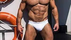 Go-muscle-go 7 features a personal trainer with a hairy, muscular build and massive cumshot