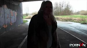 Mature Blonde Babe Exposes Her Natural Tits and Pisses in Public Streets.