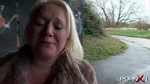 Mature Blonde Babe Exposes Her Natural Tits and Pisses in Public Streets.