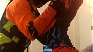 This gay dude gives a motocross blowjob in fetish costumes.