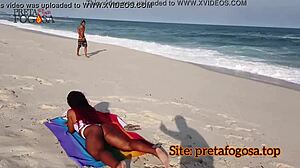 Boldly, the young girl touches herself on the deserted beach as the well-endowed guy intensely licks her shaved pussy to orgasm.