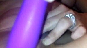 A young woman explores solo masturbation in private.