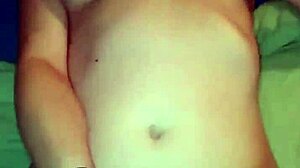 A young woman explores solo masturbation in private.