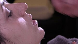 Queen Mona gives a close-up blowjob to a monster cock, ending with a cumshot on her face.