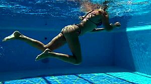 Russian Milf Mary Kalisy Touches Herself in Bikini by Pool.