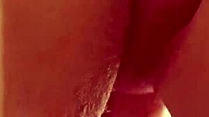 Close up of a shaven twat getting licked and fingered to an orgasm