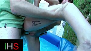 The sexy girl gets fucked in her ass and pussy outdoors by the pool