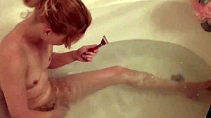 blonde petite 18+ emi clear shaves her legs and her little 18+ pussy