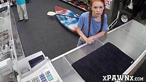 Little redhead temptress seduces and fucks hard in hidden pawnshop cam