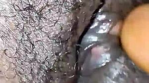 I gently touch my pussy in a sensual way