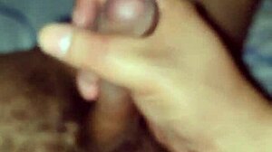 gay guy playfully sucks on a big toy in suggestive way