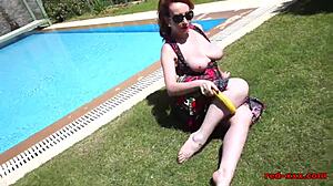 Red XXX Stuffs Her Mature Pussy with a Banana Outdoors – Oh Yes!