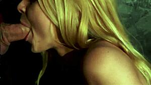 In the glory hole, sexy blonde sarah eagerly swallows a monster cock, her tits bouncing as she deepthroats.