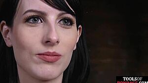 yo, watch this busty babe ride sybian under dom's control