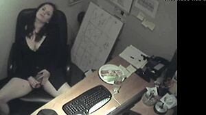 secretary in uniform rubs her boobs and masturbates to orgasm in the office