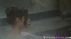 naked asian teen showers outdoors, spied on by voyeur