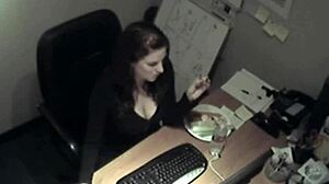 secretary in uniform rubs her boobs and masturbates to orgasm in the office