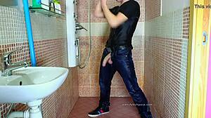 Gay guy masturbates in jeans under shower fetish