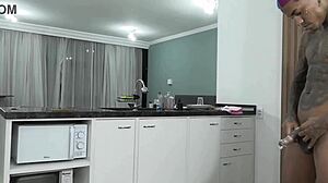 This athletic black babe in lingerie teases a young guy in the kitchen 😏