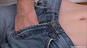 Hot gay stud indulges in foot worship with twink in fetish scene. Feet and blowjob action unfolds.