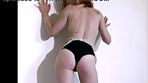 Juls performs slow burlesque yoga with tattoos and small natural tits