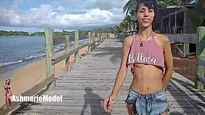 I see a hairy woman bouncing her tits outdoors.