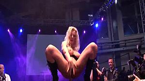 Stepmom flexes big tits, rips clothes, shows dildo on public stage!