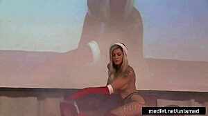 female and male strippers tease the audience with undressing and dancing