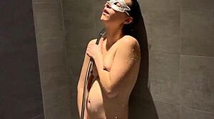 gorgeous amateur wife strokes herself in shower while man watches