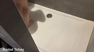 gorgeous amateur wife strokes herself in shower while man watches