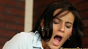 Clothed lesbians pee off desk