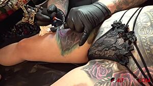 marie bossette gropes her big tits and pussy during tattoo session 😈