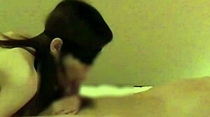 Beautiful woman in Chinese dress stimulates penis with handjob and blowjob