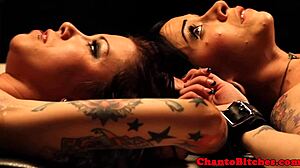 Lezdom mistress intensely dominates and binds her submissive lesbian partners in bondage