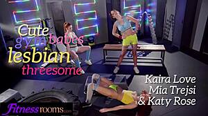 Provocative Threesome Scissoring In Gym
