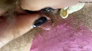hey, check out this extreme big clit rubbing on wet hairy pussy