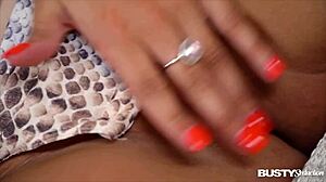 Katie T licks her big boobs in solo masturbation