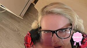 watch this cute blond get fucked in uniform, cum splashing on her glasses