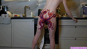 Naked housewife with octopus tattoo cooks dinner and ignores you
