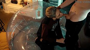 Two sweet guys share an inflatable chair.